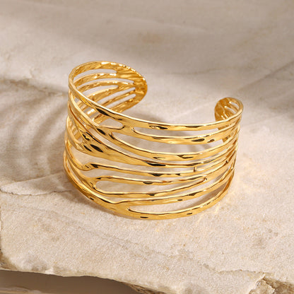 Stainless steel 18k gold-plated hollow bangle