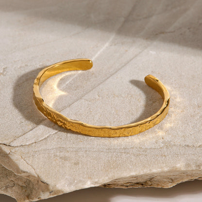 Stainless steel 18k gold-plated wave-patterned open-ended bracelet